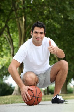 Portrait of a man with basket-ball clipart