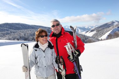 High-spirited seniors at ski clipart