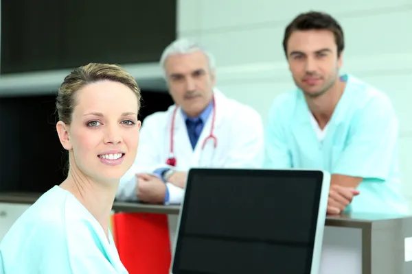 Medical professionals in a clinic — Stock Photo, Image