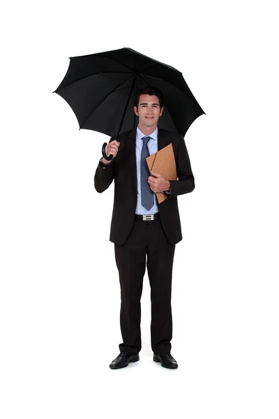 Banqueiro com guarda-chuva isolado em branco — Fotografia de Stock