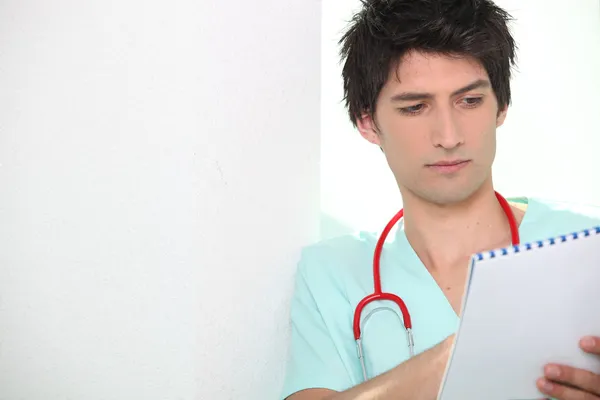 Male nurse with notebook — Stock Photo, Image
