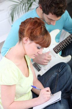 Musicians composing a song together clipart