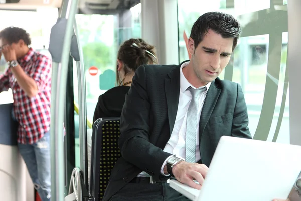 Young man in public transportation — Stock Photo, Image