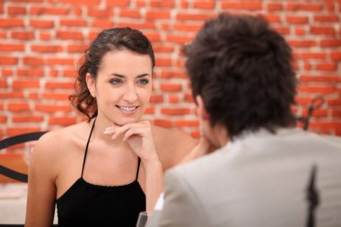Woman having in an interesting conversation clipart