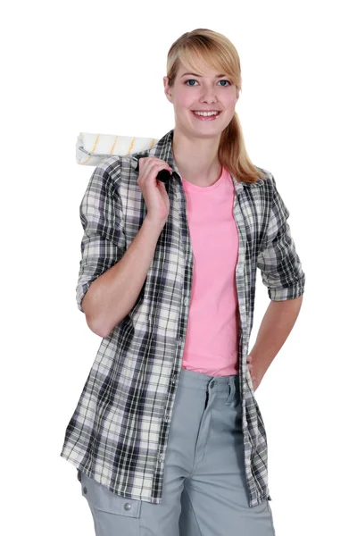 Woman stood with paint roller — Stock Photo, Image