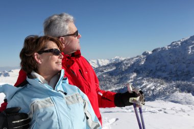 Couple on skiing holiday clipart