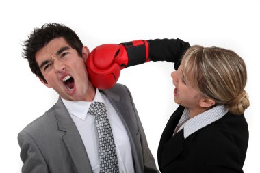 Woman punching her colleague clipart