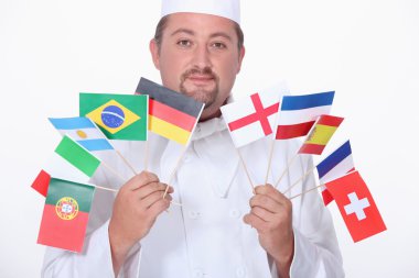 Chef holding flags clipart