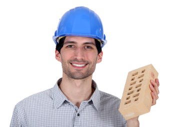 Builder showing a brick clipart