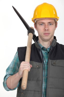 Young worker with pick-Axe clipart