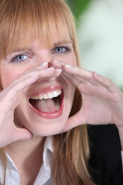 Portrait of a young woman screaming clipart