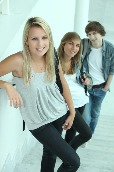 Portrait of 3 teenagers in stairs — Stock Photo, Image