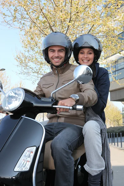 Friends having a ride on scooter — Stock Photo, Image