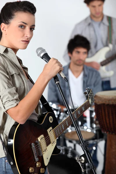 A band jamming together — Stock Photo, Image