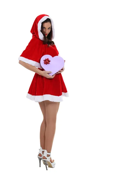 Miss Santa Saucy avec une boîte cadeau en forme de coeur — Photo