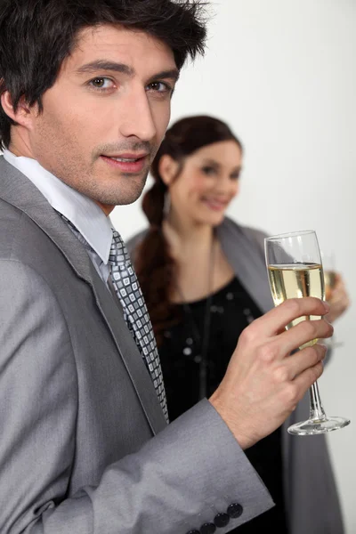 Elegant man drinking champagne — Stock Photo, Image