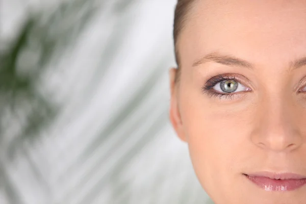 Close-up van de schoonheid van een vrouw gezicht — Stockfoto