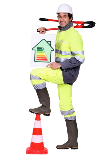 A road worker promoting energy savings. — Stock Photo, Image