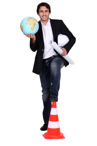 Architect holding globe — Stock Photo, Image