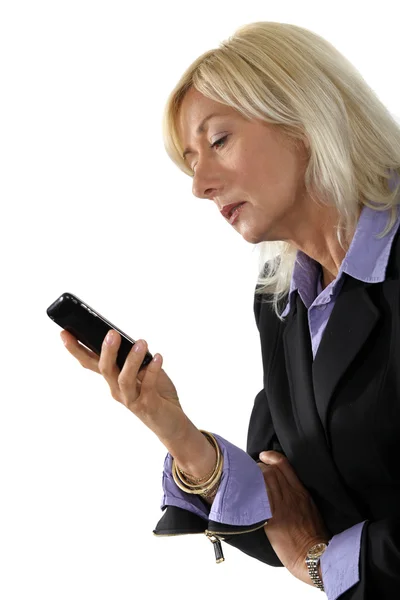 Mature businesswoman holding a cell — Stock Photo, Image