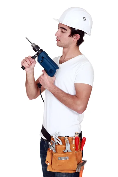 Young man with drill — Stock Photo, Image