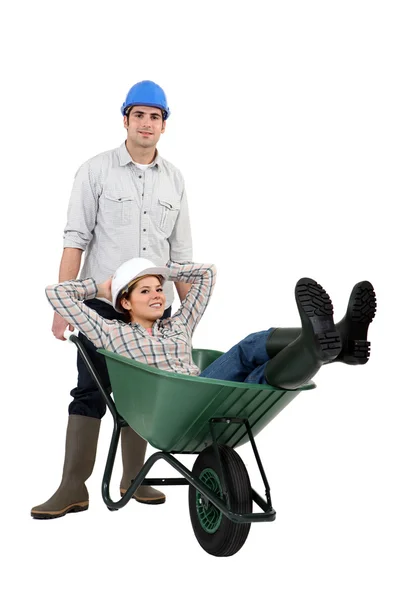 Builders and wheelbarrow — Stock Photo, Image