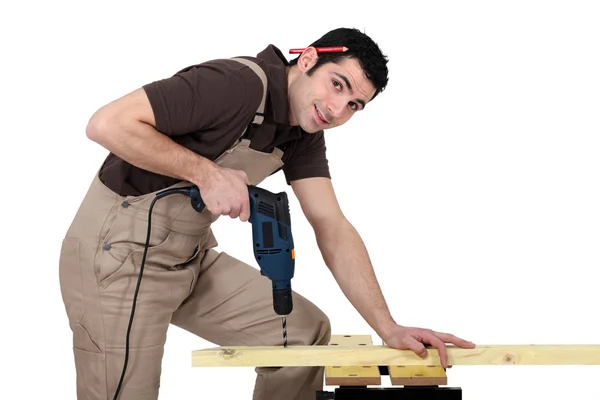 Handyman utilizzando un utensile elettrico — Foto Stock