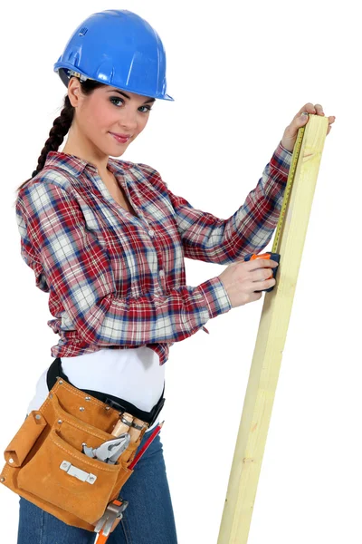 Női carpenter fehér háttér — Stock Fotó