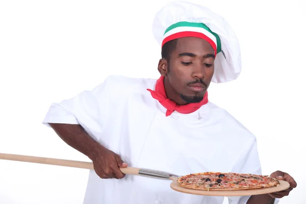 Muž s pizzou — Stock fotografie