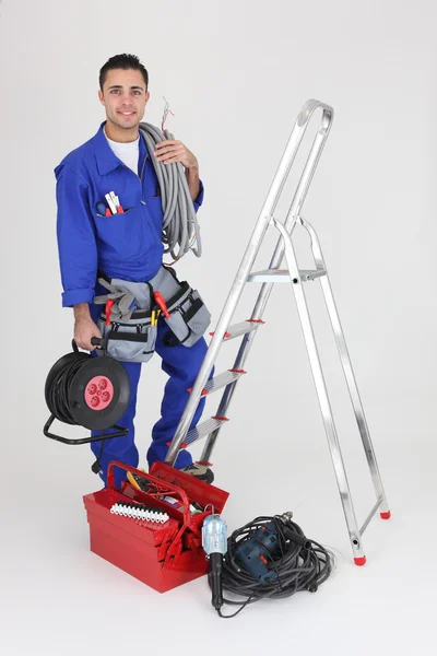 Tradesman with his tools — Stock Photo, Image