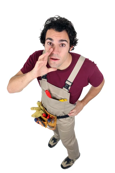 Laborer in dungarees on white background — Stock Photo, Image