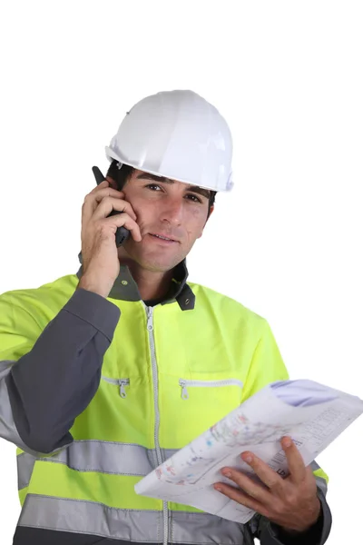 Worker with a walkie talkie — Stock Photo, Image