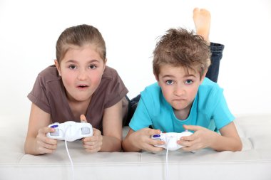 Brother and sister playing video games clipart