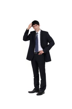 Businessman scratching his head clipart