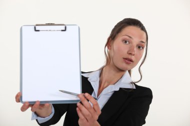 Business professional pointing to a clipboard clipart