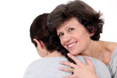 Two women hugging clipart