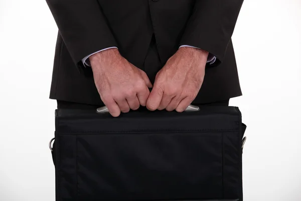 Holding a táskáját üzletember — Stock Fotó