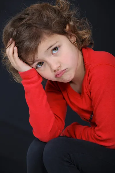 Little girl sulking. — Stockfoto
