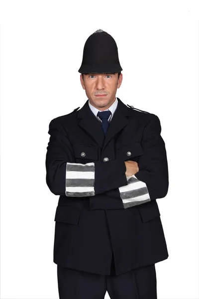 Man in English policeman costume — Stock Photo, Image