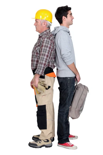 Apprentice stood with master — Stock Photo, Image