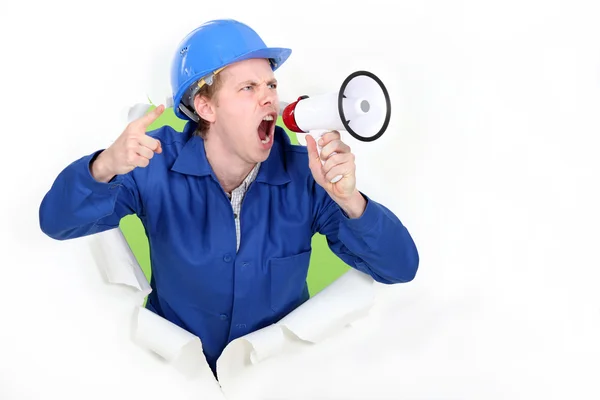 Construction worker with a megaphone — Stock Photo, Image