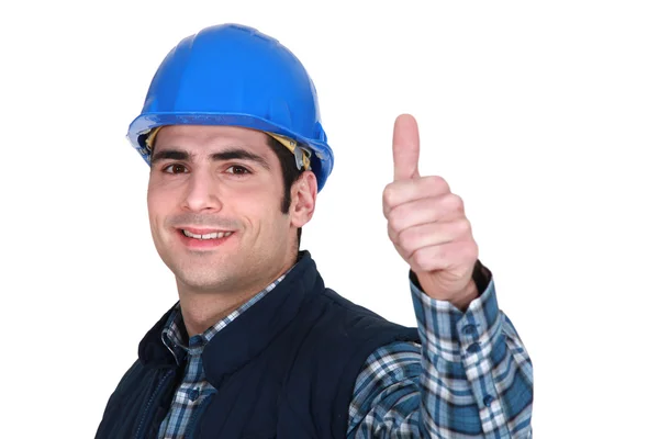 Trabalhador fazendo polegares para cima — Fotografia de Stock