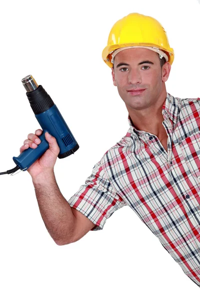 Handwerker mit einer Bohrmaschine — Stockfoto