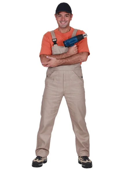 A handyman with a air blower. — Stock Photo, Image
