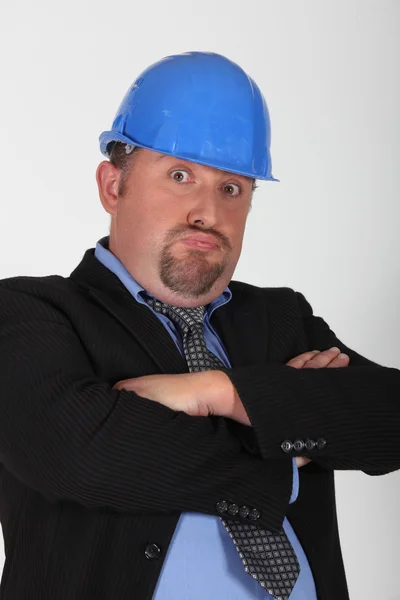 Ogilla affärsman i en hardhat — Stockfoto