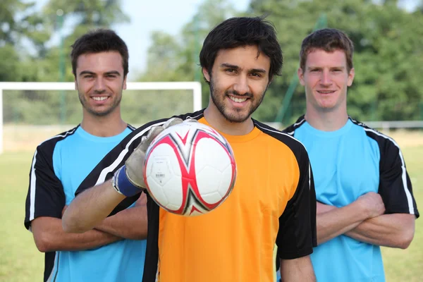 Tři fotbalové spoluhráče — Stock fotografie