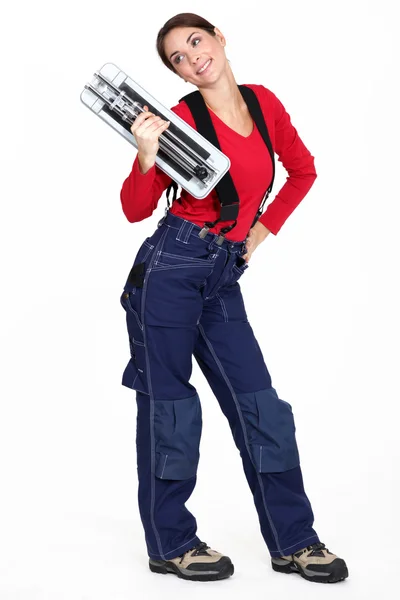 Woman with a tile cutter Stock Photo