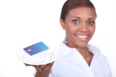 Waitress with the bill and a credit card clipart