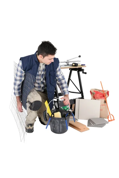 Tradesman moving his tools — Stock Photo, Image