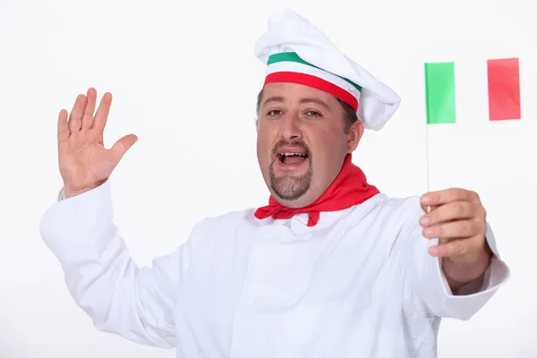 Chef italiano acenando uma bandeira — Fotografia de Stock